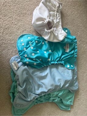 4 Cloth Diapers AIO all-in-one Apple Cheeks and Elemental Joy. Bonus swim diaper
